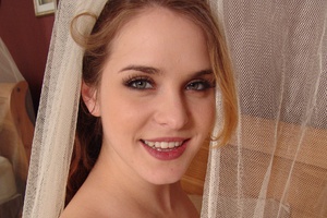 Pregnant cutie undressing Image 9