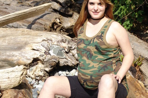 A pregnant amateur posing wholly naked Image 1