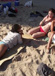 A bikini lady going topless on the La Joya Nude Image 3