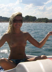 A busty bikini bitch undressing on the Hanauma Image 7