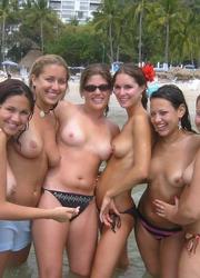 Bikini girl flashing on the Matira Image 4