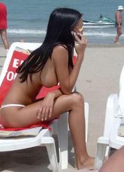 A slim and busty babe on the Matira Image 4