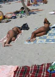 A busty bikini slut undressing on the Koh Phangan Image 4