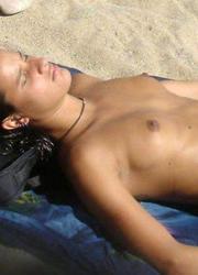A nude cutie on the Tenerife Image 11