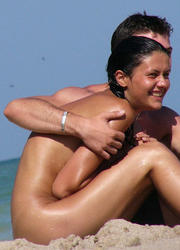 A busty bikini bitch undressing on the Clifton Image 10
