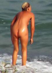 A busty bikini bitch undressing on the Clifton Image 11