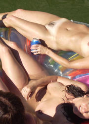 A girl removing her micro bikini at the Mazo Image 10
