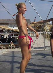 A slim girl posing on the Nugal Image 5