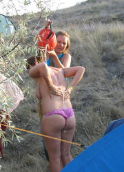 A girl on open swim suit at the Poipu Image 4