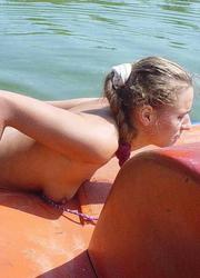 A girl on open swim suit at the Poipu Image 10
