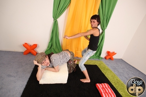 Watch these young naughty guys seducing their a bit chubby blonde friend. Image 1