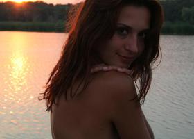 My romantic girlfriend likes to swim nude on a lonely beach at sunset. Image 6