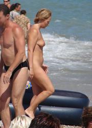 A nude teen girl posing at the Nugal Image 5